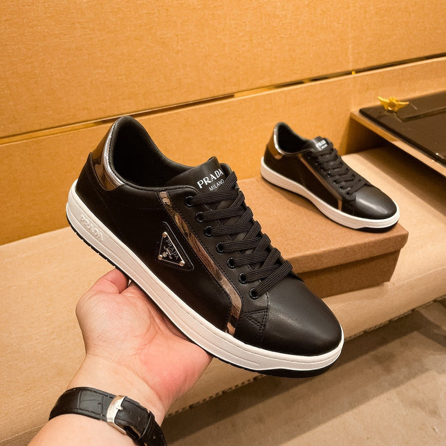 PRA SNEAKER IN BLACK CALFSKIN WITH GLOSSY GOLDEN