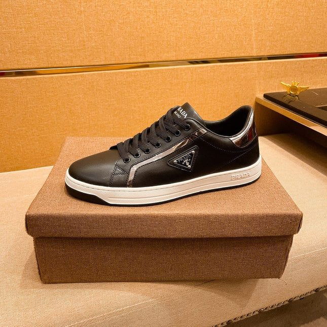 PRA SNEAKER IN BLACK CALFSKIN WITH GLOSSY GOLDEN