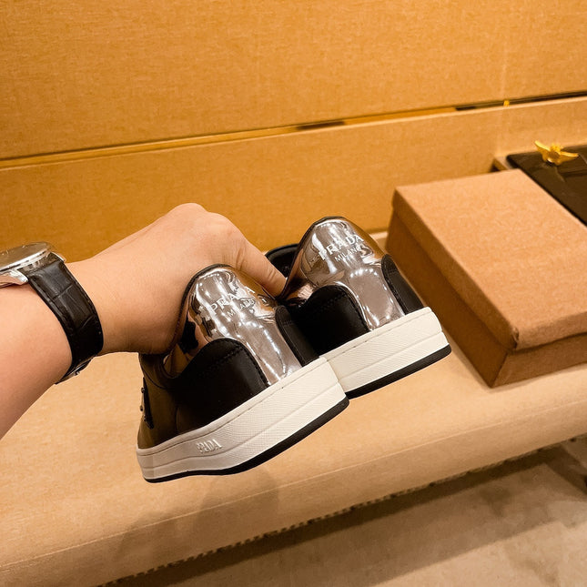 PRA SNEAKER IN BLACK CALFSKIN WITH GLOSSY GOLDEN