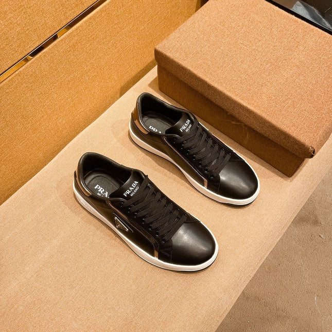 PRA SNEAKER IN BLACK CALFSKIN WITH GLOSSY GOLDEN