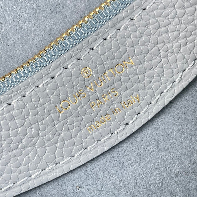 DIANE 23 IN BEAU BLUE MONOGRAM EMPREINTE LEATHER