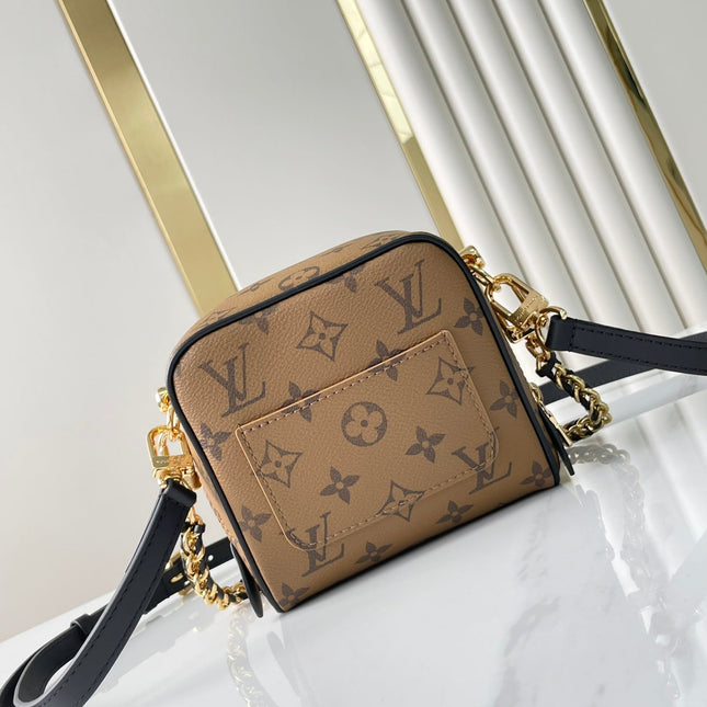 JUST IN CASE 14 IN BROWN MONOGRAM REVERSE CANVAS GOLD HARDWARE
