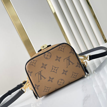 JUST IN CASE 14 IN BROWN MONOGRAM REVERSE CANVAS GOLD HARDWARE