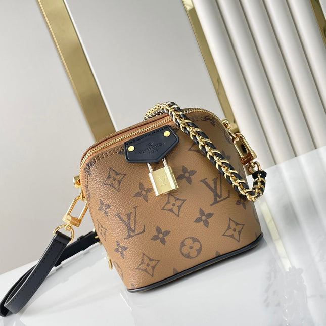 JUST IN CASE 14 IN BROWN MONOGRAM REVERSE CANVAS GOLD HARDWARE