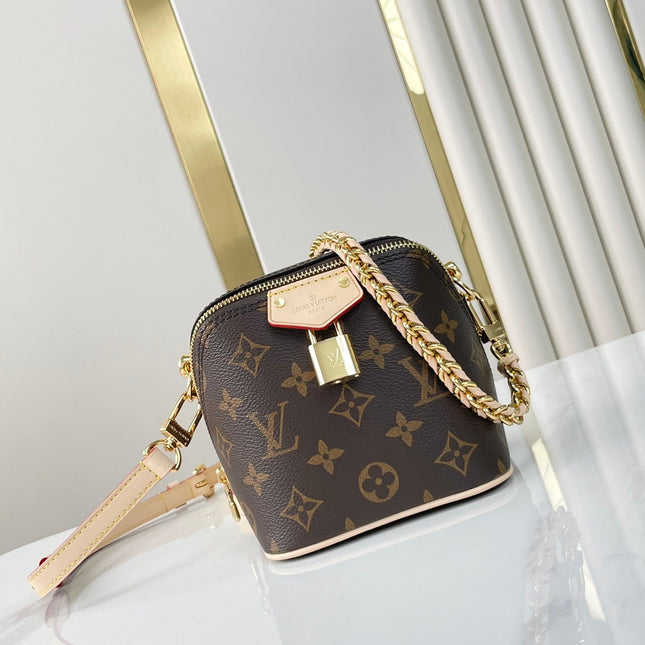 JUST IN CASE 14 IN BROWN MONOGRAM CANVAS GOLD HARDWARE