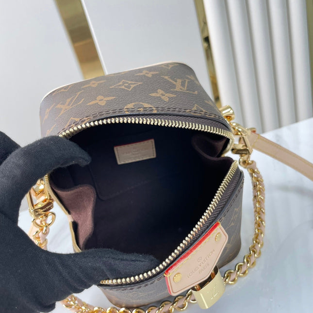 JUST IN CASE 14 IN BROWN MONOGRAM CANVAS GOLD HARDWARE
