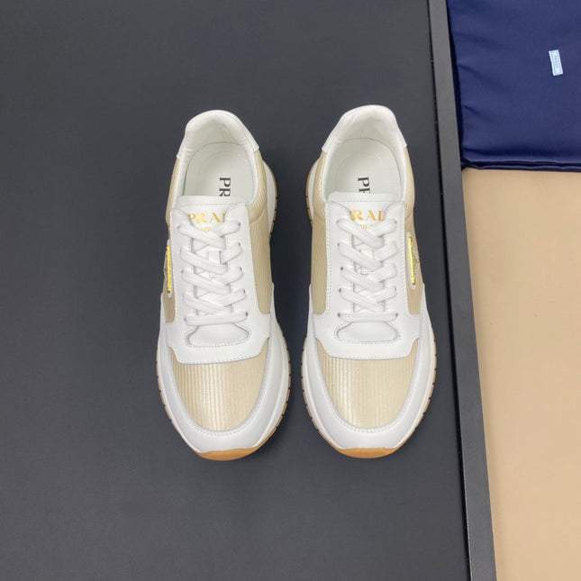 PRA SNEAKER IN WHITE CALFSKIN AND GOLD FABRIC WITH GOLDEN LOGO