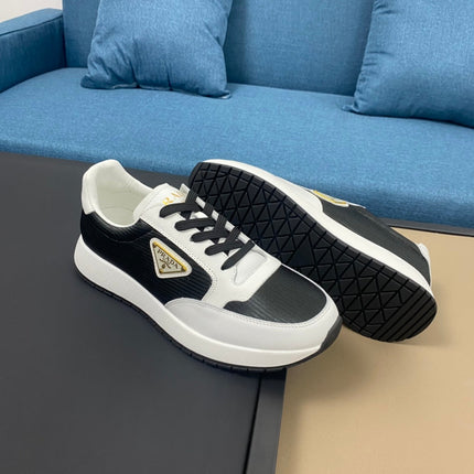 PRA SNEAKER IN WHITE CALFSKIN AND BLACK FABRIC WITH GOLDEN LOGO
