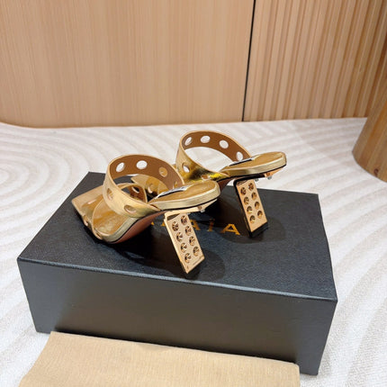 ALAIA TWO-STRAPS HIGH HEEL SANDALS IN GOLDEN PATENT LAMBSKIN