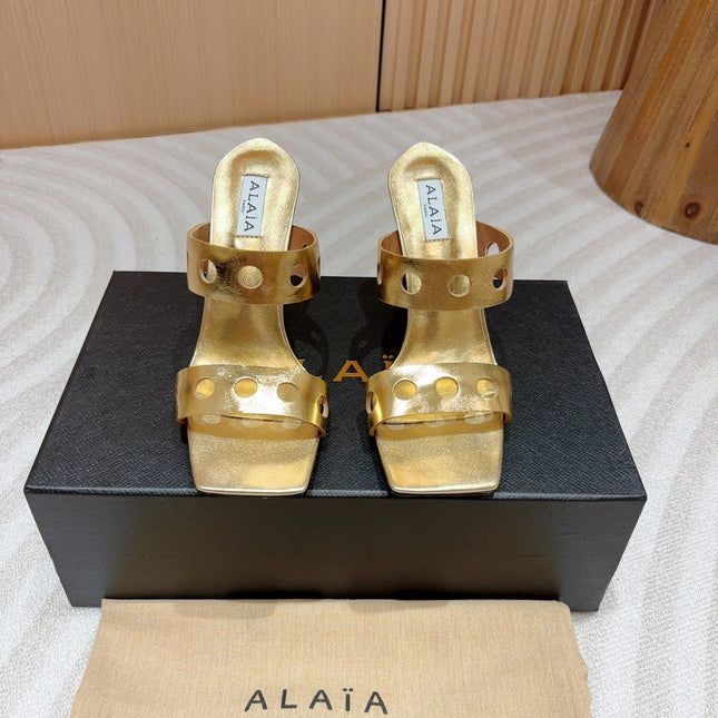 ALAIA TWO-STRAPS HIGH HEEL SANDALS IN GOLDEN PATENT LAMBSKIN