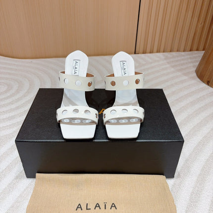 ALAIA TWO-STRAPS HIGH HEEL SANDALS IN WHITE PATENT LAMBSKIN