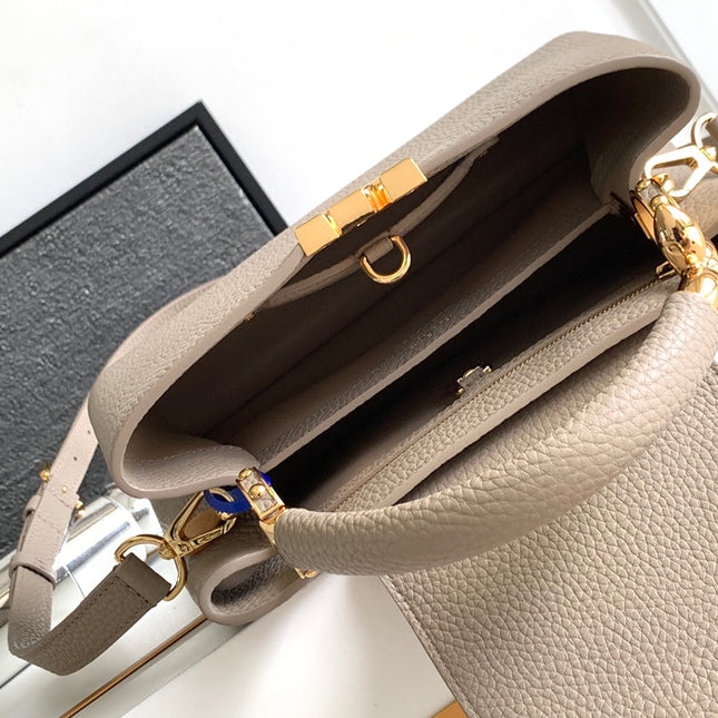 CAPUCINES BB 27 IN KHAKI BROWN TAURILLON GOLD HARDWARE