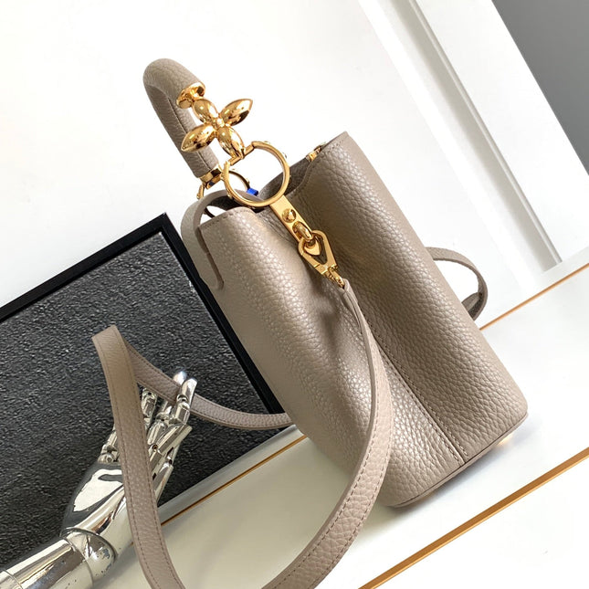 CAPUCINES BB 27 IN KHAKI BROWN TAURILLON GOLD HARDWARE