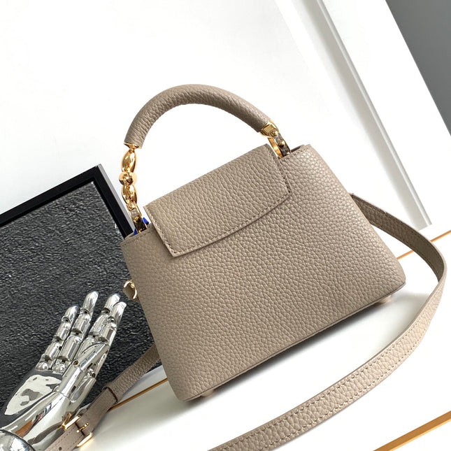 CAPUCINES MINI 21 IN KHAKI BROWN TAURILLON GOLD HARDWARE