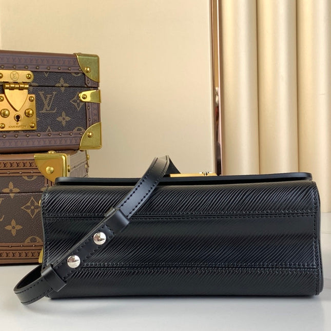 TWIST MM 23 IN BLACK EPI LEATHER GOLD AND SILVER HARDWARE
