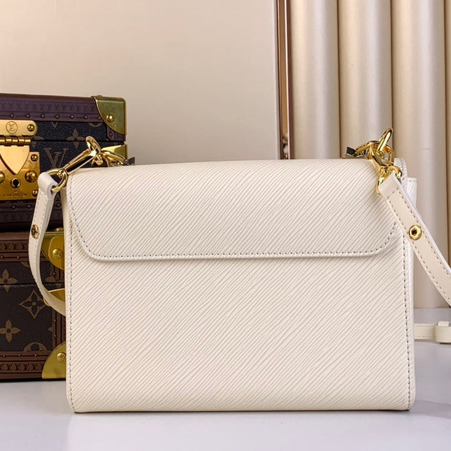 TWIST MM 23 IN QUARTZ WHITE EPI LEATHER GOLD HARDWARE