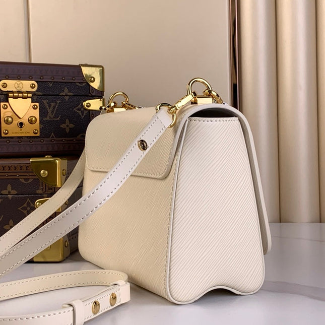 TWIST MM 23 IN QUARTZ WHITE EPI LEATHER GOLD HARDWARE