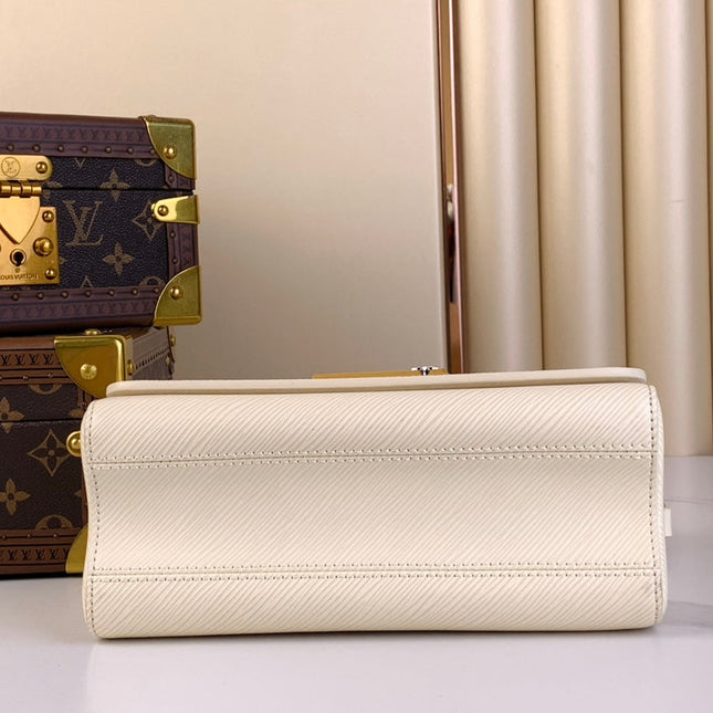 TWIST MM 23 IN QUARTZ WHITE EPI LEATHER GOLD HARDWARE