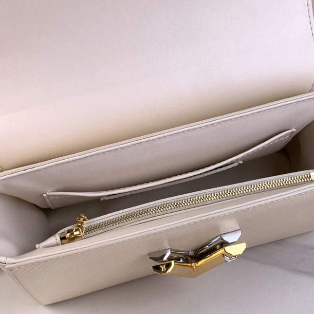 TWIST MM 23 IN QUARTZ WHITE EPI LEATHER GOLD HARDWARE