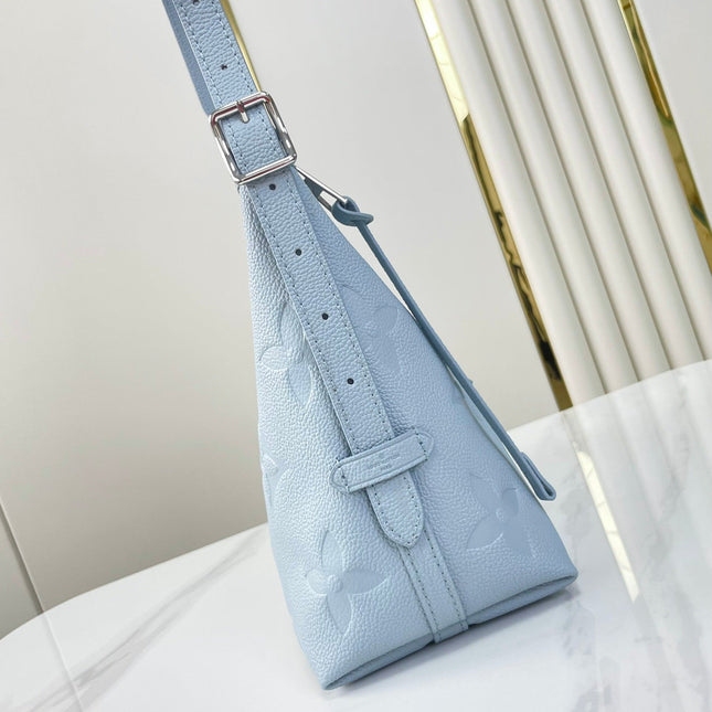CARRYALL PM 29 IN BEAU BLUE MONOGRAM EMPREINTE LEATHER