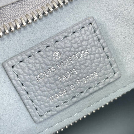 CARRYALL PM 29 IN BEAU BLUE MONOGRAM EMPREINTE LEATHER