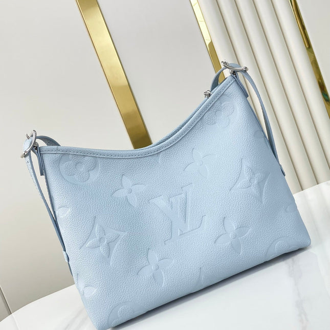 CARRYALL PM 29 IN BEAU BLUE MONOGRAM EMPREINTE LEATHER
