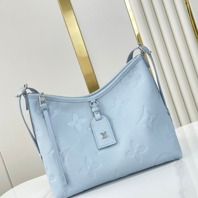 CARRYALL PM 29 IN BEAU BLUE MONOGRAM EMPREINTE LEATHER