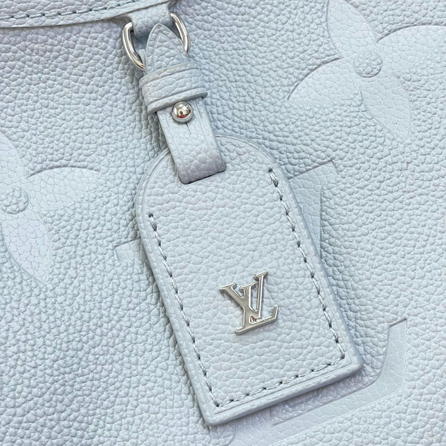 CARRYALL PM 29 IN BEAU BLUE MONOGRAM EMPREINTE LEATHER