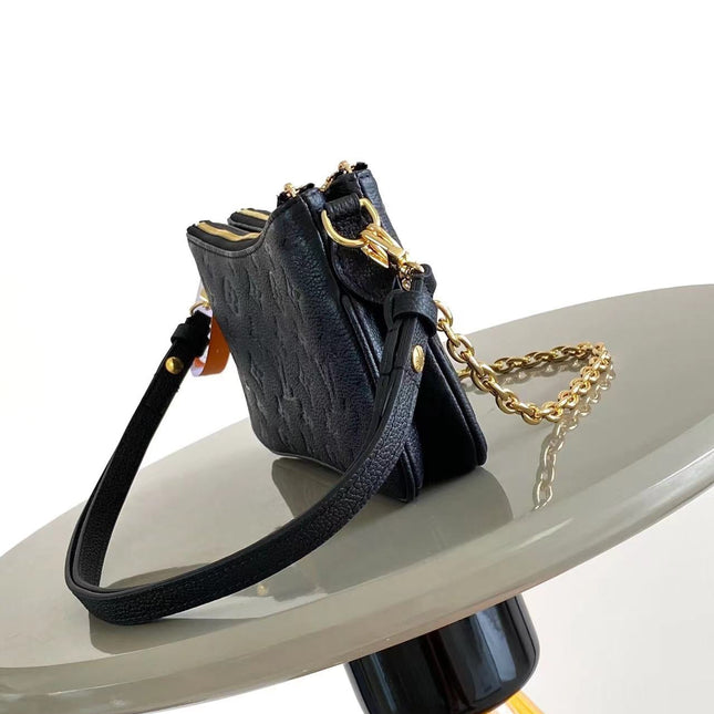 LIV POCHETTE 24 IN BLACK MONOGRAM EMPREINTE LEATHER GOLD HARDWARE