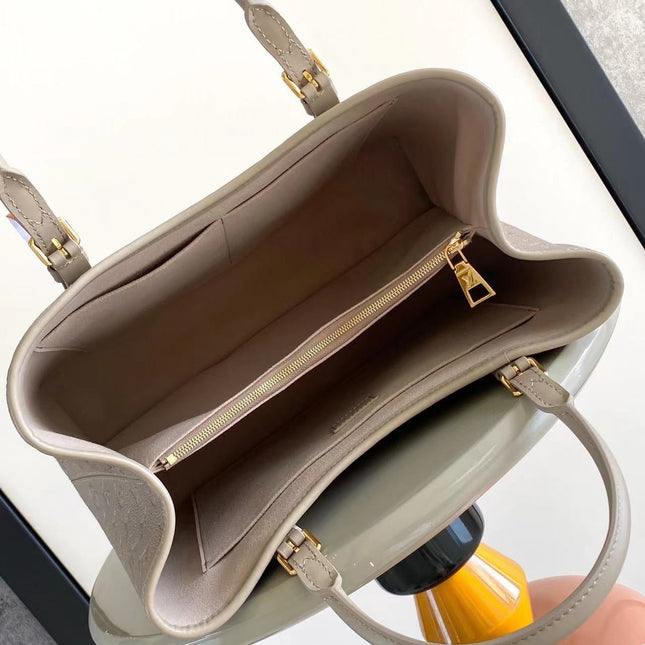 BABYLONE TOTE MM 39 IN TOURTERELLE MONOGRAM EMPREINTE LEATHER