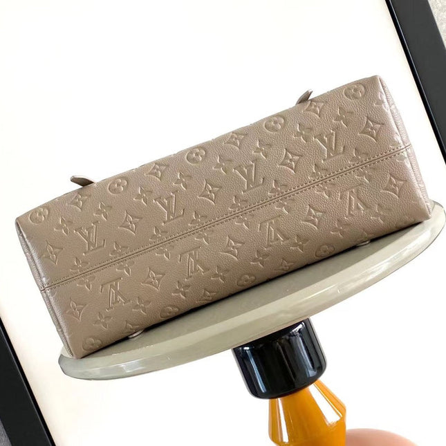 BABYLONE TOTE MM 39 IN TOURTERELLE MONOGRAM EMPREINTE LEATHER