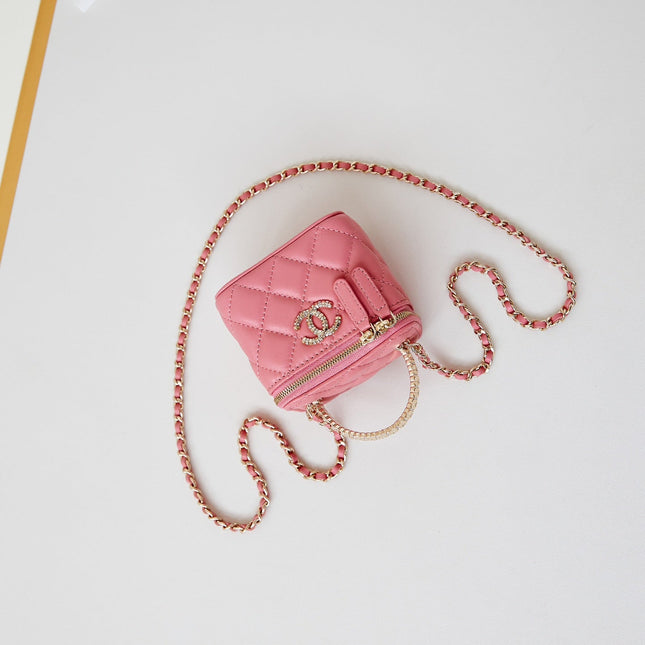 CHANEL 25S MINI VANITY BAG 11 CM IN PEACH PINK LAMBSKIN WITH CRYSTAL-EMBELLISHED CC LOGO