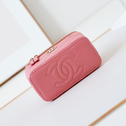 CHANEL 25S MINI VANITY BAG 16 CM IN PEACHY PINK LAMBSKIN WITH CRYSTAL-EMBELLISHED CC LOGO