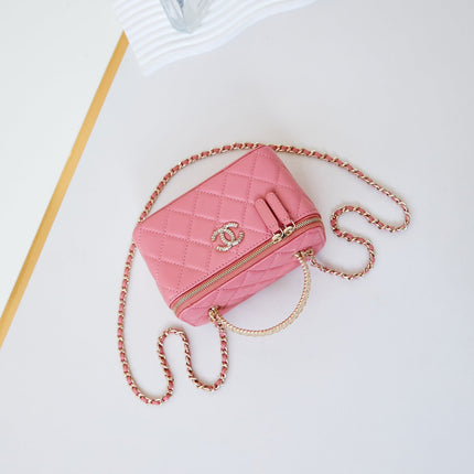 CHANEL 25S MINI VANITY BAG 16 CM IN PEACHY PINK LAMBSKIN WITH CRYSTAL-EMBELLISHED CC LOGO