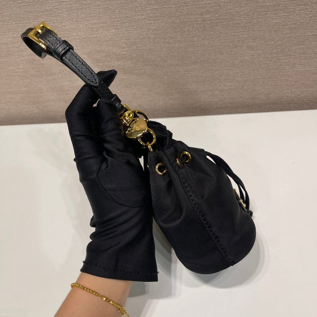MINI BUCKET BAG 10 IN BLACK RE-NYLON AND SAFFIANO LEATHER STRAP
