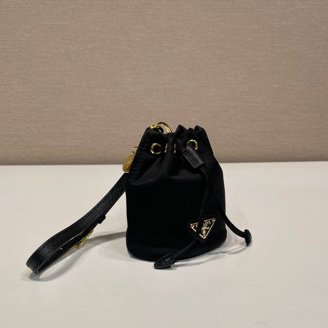 MINI BUCKET BAG 10 IN BLACK RE-NYLON AND SAFFIANO LEATHER STRAP