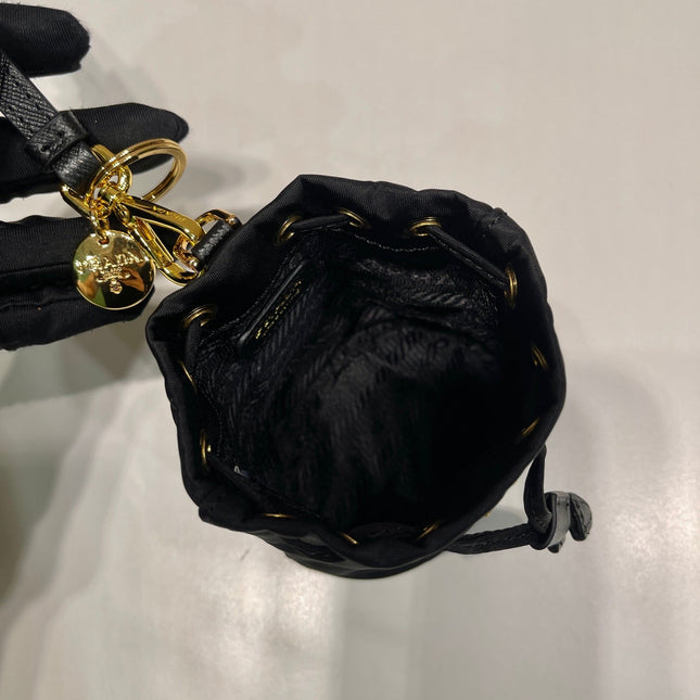 MINI BUCKET BAG 10 IN BLACK RE-NYLON AND SAFFIANO LEATHER STRAP