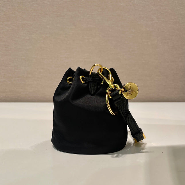 MINI BUCKET BAG 10 IN BLACK RE-NYLON AND SAFFIANO LEATHER STRAP