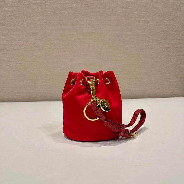 MINI BUCKET BAG 10 IN RED RE-NYLON AND SAFFIANO LEATHER STRAP