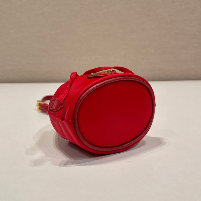 MINI BUCKET BAG 10 IN RED RE-NYLON AND SAFFIANO LEATHER STRAP