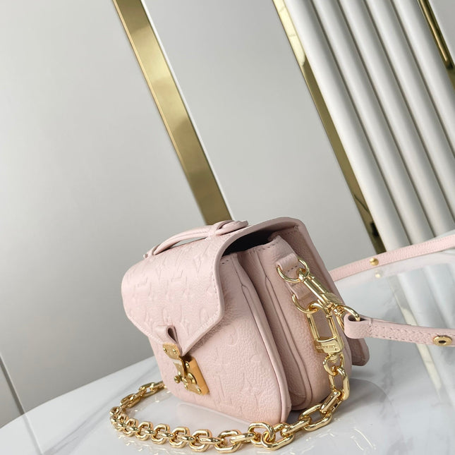 POCHETTE MÉTIS EAST WEST 21 IN PINK OPALE MONOGRAM ECLIPSE CANVAS GOLD BUCKLE