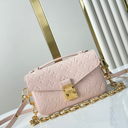 POCHETTE MÉTIS EAST WEST 21 IN PINK OPALE MONOGRAM ECLIPSE CANVAS GOLD BUCKLE