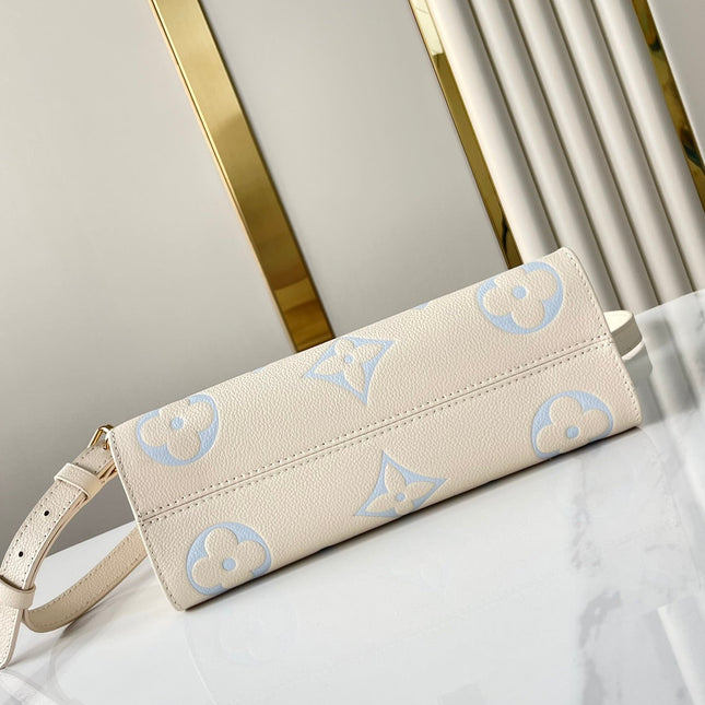 ONTHEGO 25 IN CREAM BLUE CALFSKIN GOLD HARDWARE