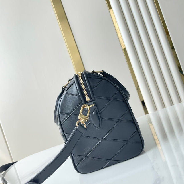 SPEEDY BANDOULIÈRE 25 WITH CRISS CROSS PATTERN IN BLACK LAMBSKIN