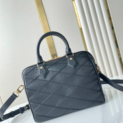 SPEEDY BANDOULIÈRE 25 WITH CRISS CROSS PATTERN IN BLACK LAMBSKIN