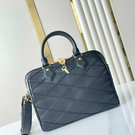 SPEEDY BANDOULIÈRE 25 WITH CRISS CROSS PATTERN IN BLACK LAMBSKIN