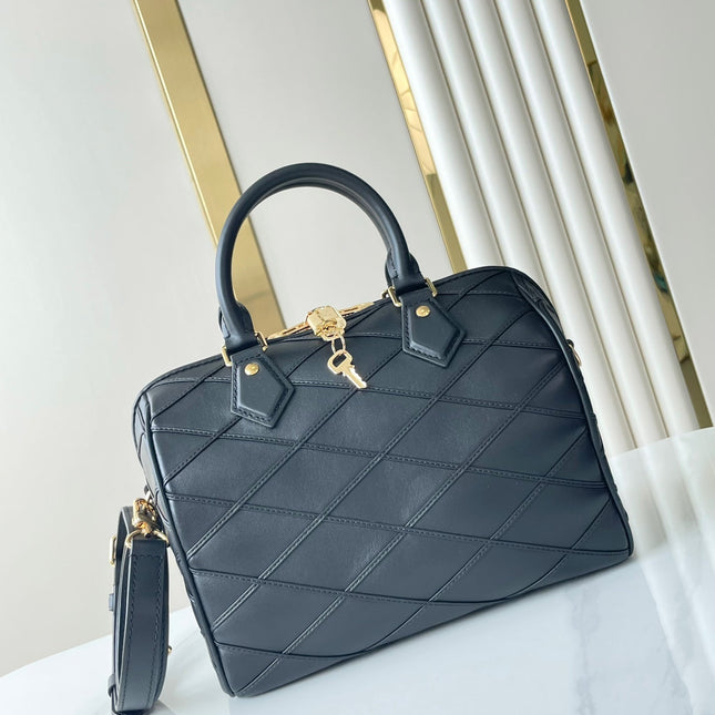 SPEEDY BANDOULIÈRE 25 WITH CRISS CROSS PATTERN IN BLACK LAMBSKIN