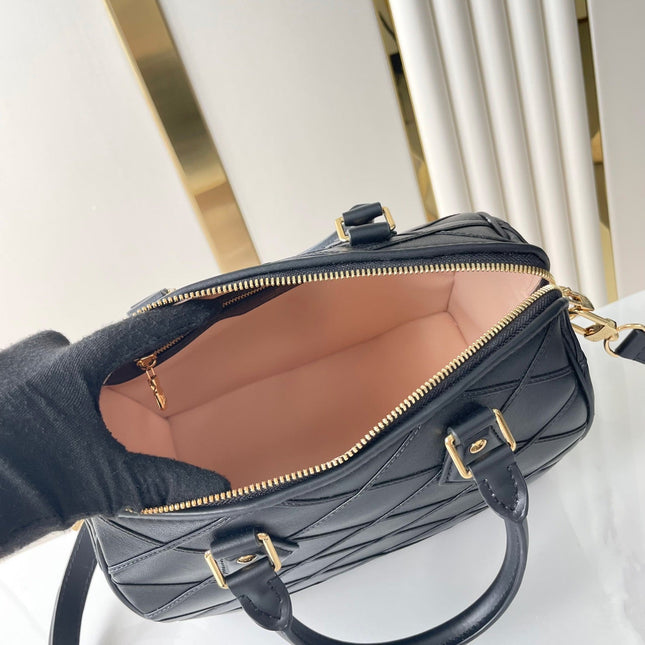 SPEEDY BANDOULIÈRE 25 WITH CRISS CROSS PATTERN IN BLACK LAMBSKIN