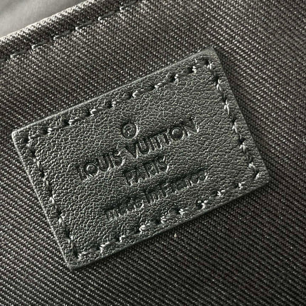 MESSENGER VOYAGER PM 33 IN GUN METAL MONOGRAM ECLIPSE CANVAS
