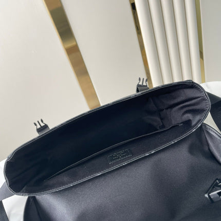 MESSENGER VOYAGER PM 33 IN GUN METAL MONOGRAM ECLIPSE CANVAS